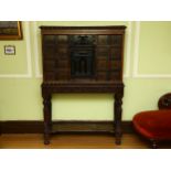 An 18th century Continental rosewood cabinet on stand, possibly Spanish or Portuguese, the central