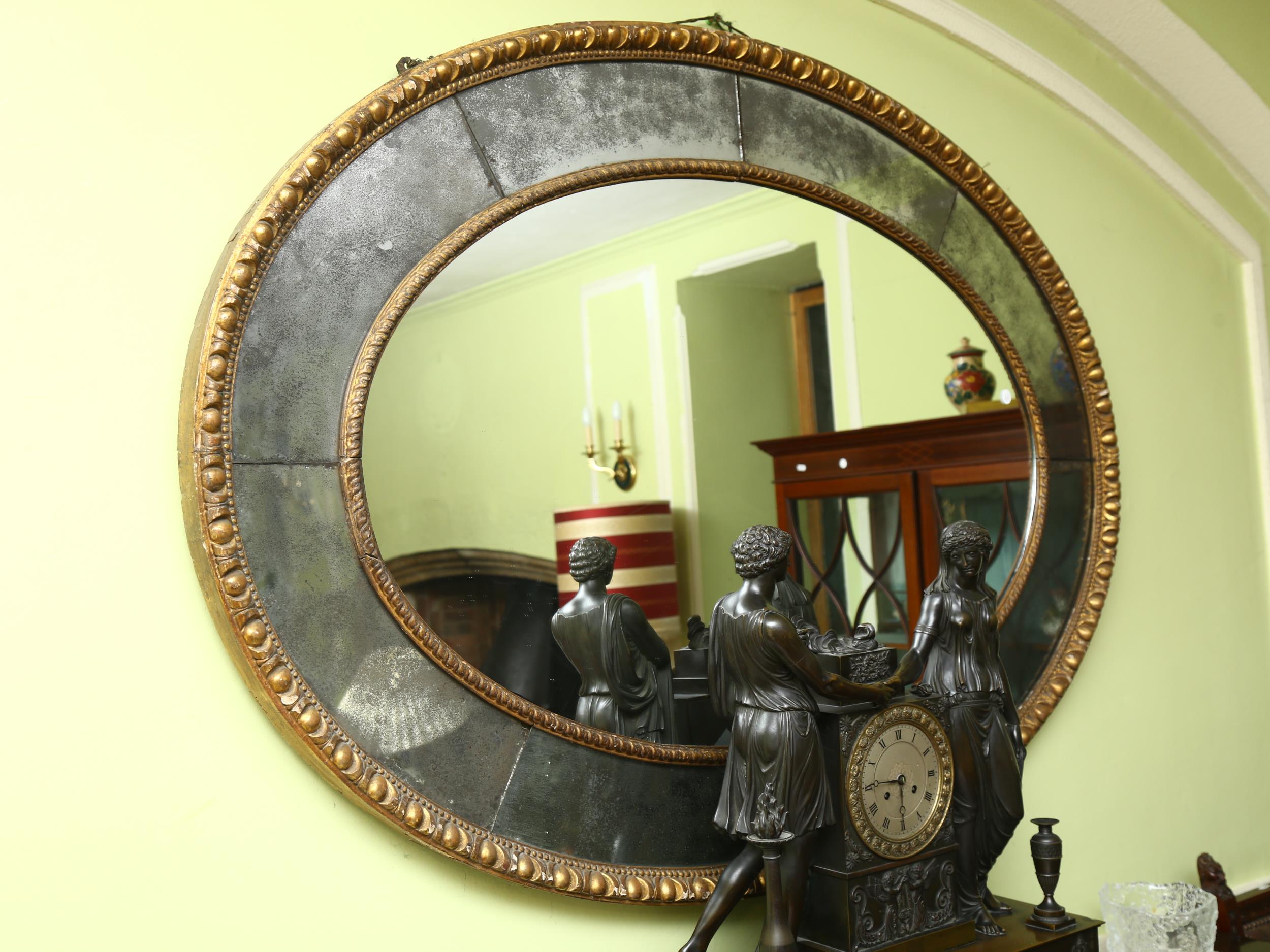 A large oval gilt-framed wall mirror, with inset oxidised mirrored surround, overall measurements - Image 3 of 8