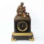A 19th century ormolu mounted slate-cased mantel clock, surmounted by a gilt-bronze woman and child,