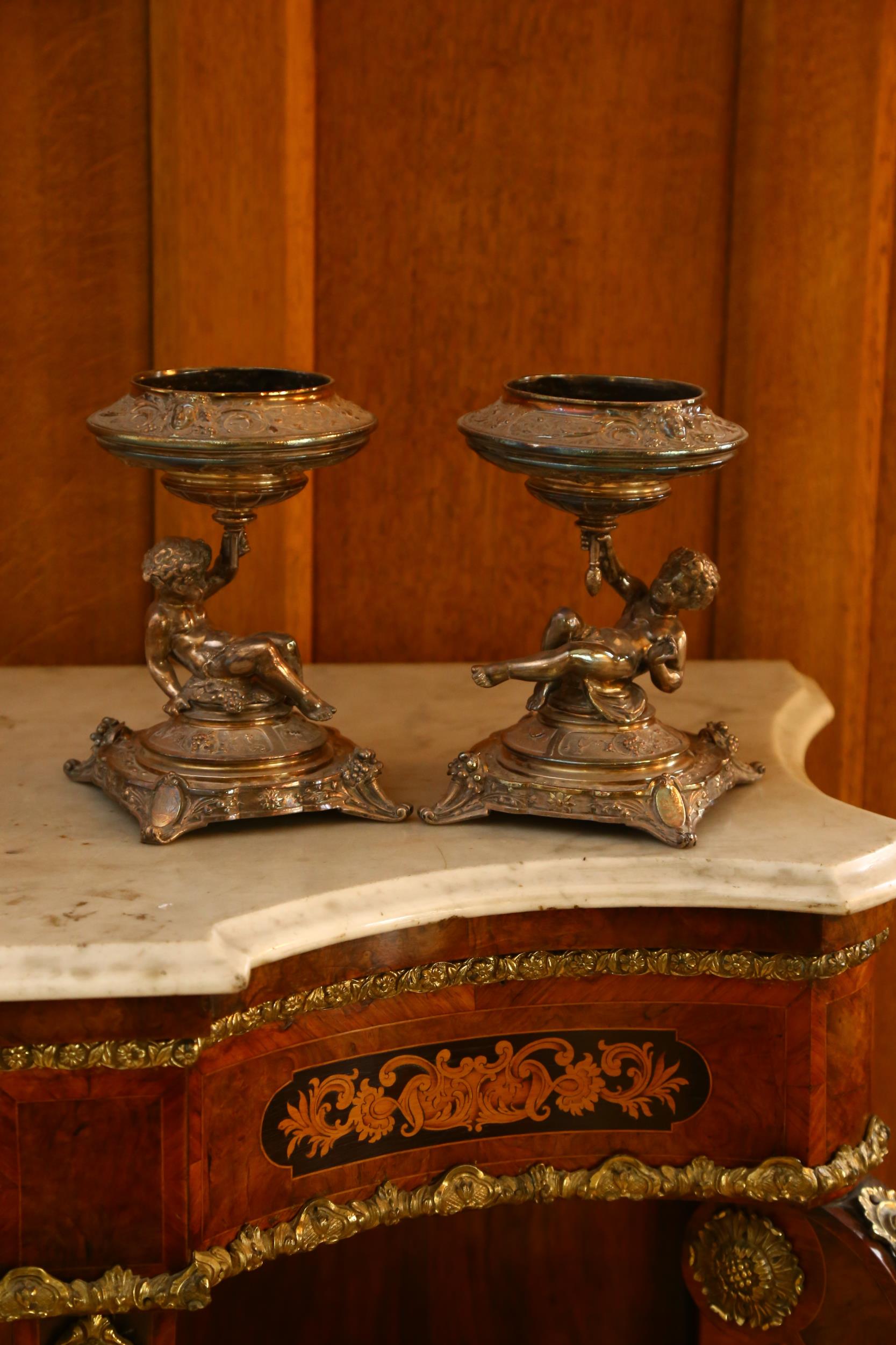 ELKINGTON & CO - a pair of 19th century silver plate table centres, circa 1883, Bacchanalian putti