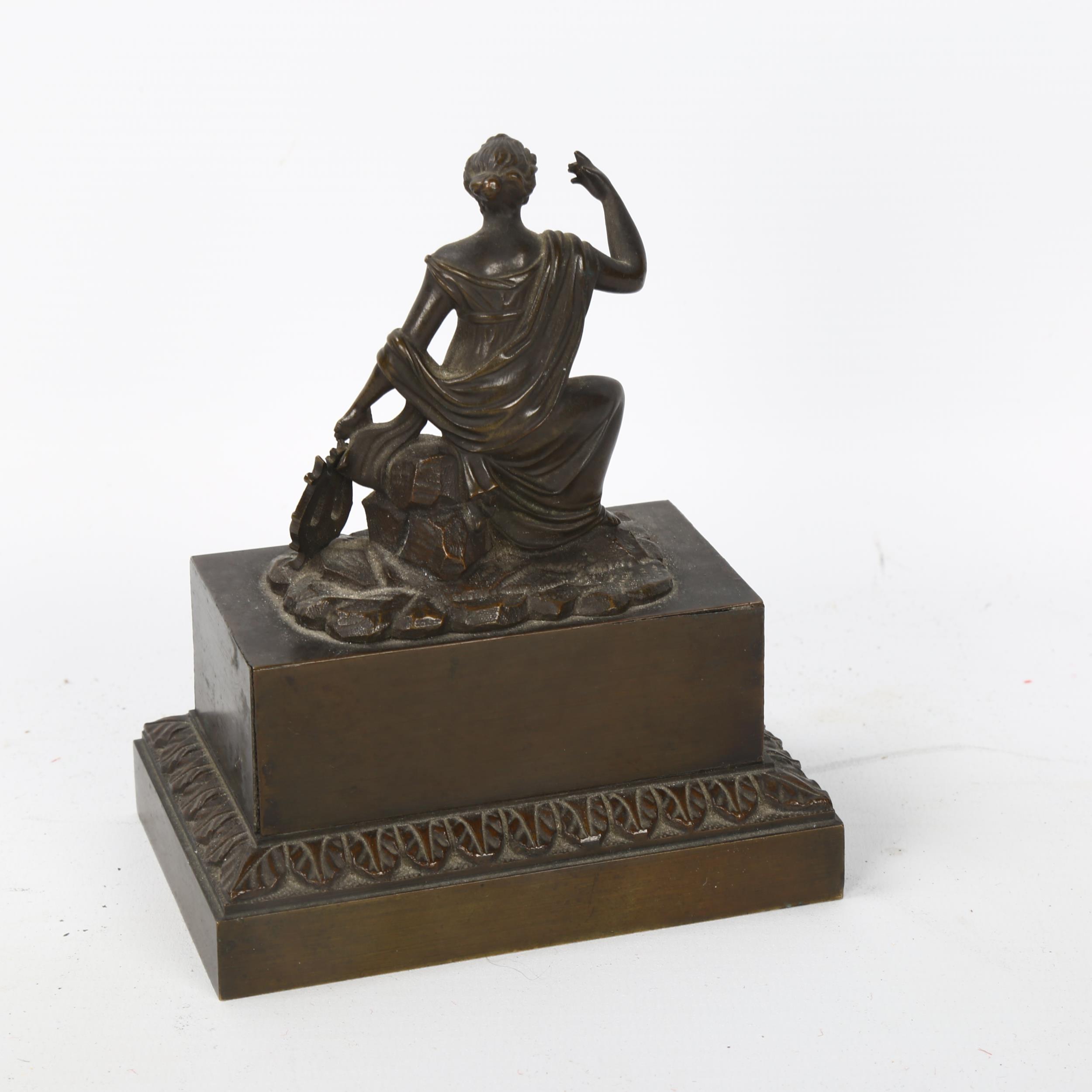 A 19th century patinated bronze figural desk companion, with Classical lady cover opening to - Image 4 of 5