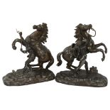 A pair of spelter Marley horse ornaments, height 18cm (1 A/F)