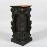 A 19th century relief cast-bronze square section pedestal, with alcove sides and Classical figures