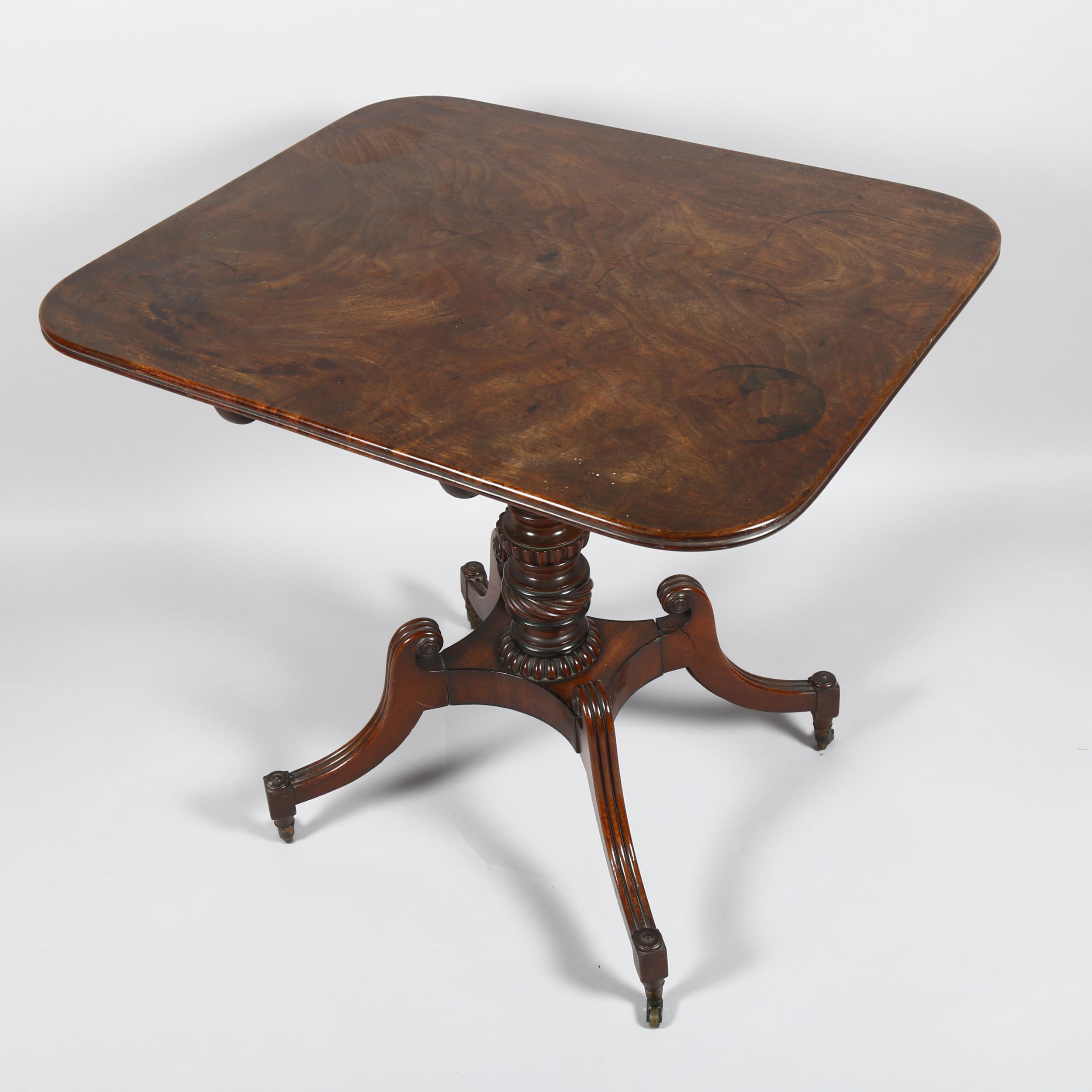 A Regency square mahogany tilt-top table, on carved quadruple base with brass casters, 74cm x 63cm - Image 5 of 5