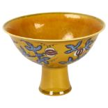 A yellow Chinese stem bowl with blue under-glaze decoration, character marks inside base, height