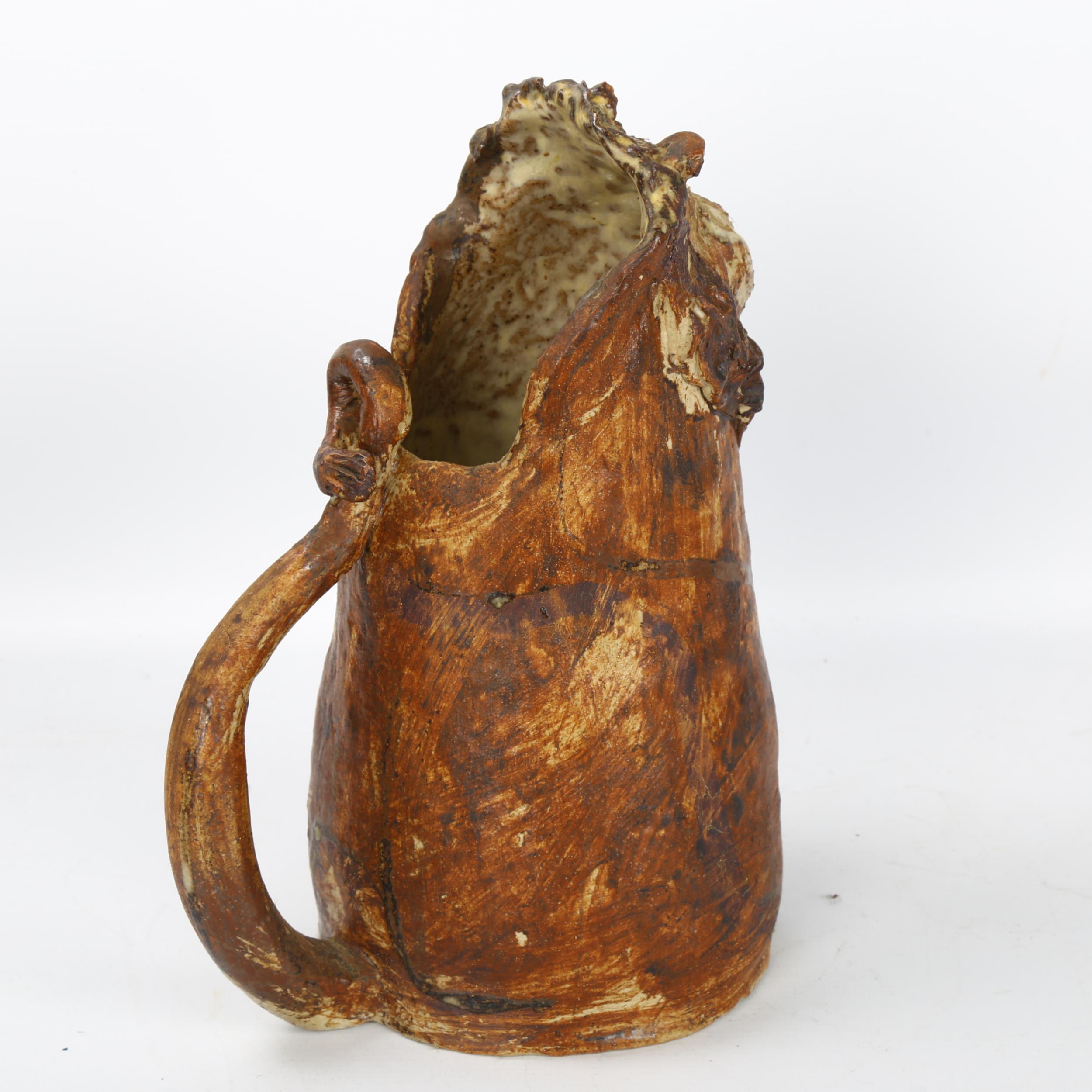 A handbuilt stoneware art jug in Lion form, artist initial L.C. to base, height 26cm Good original - Image 2 of 3