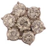 An 18ct white gold seven stone diamond flowerhead cluster ring, prong set with modern round