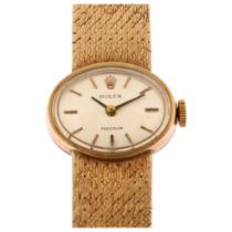 ROLEX - a lady's 9ct gold Precision mechanical bracelet watch, circa 1960s, oval silvered dial