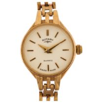 ROTARY - a lady's 9ct gold quartz bracelet watch, white dial with gilt baton hour markers and 9ct