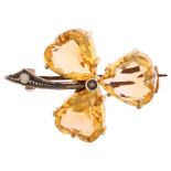 An Edwardian citrine and pearl shamrock brooch, circa 1905, unmarked gilt white metal settings