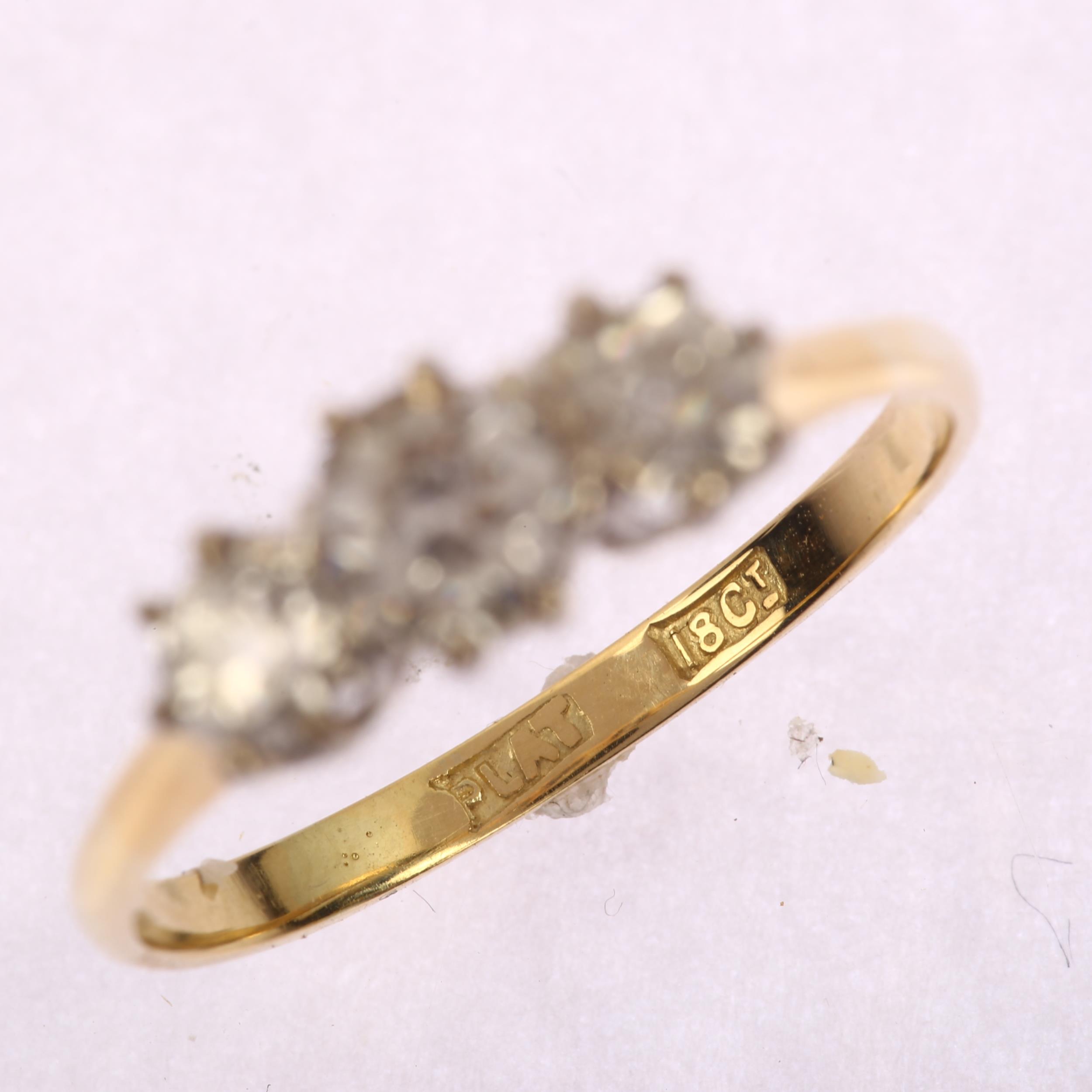 An early 20th century 18ct gold three stone diamond ring, set with old European-cut diamonds, - Image 3 of 4