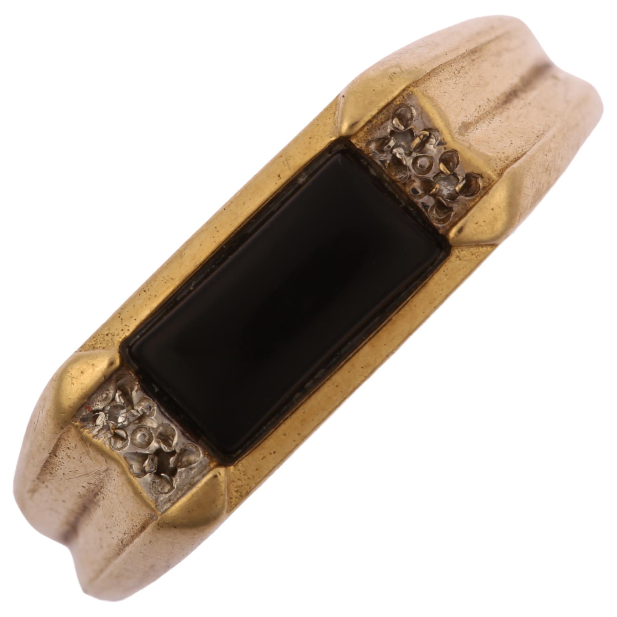 A large modern 9ct gold onyx and diamond signet ring, setting height 7.4mm, size X, 4.3g No damage