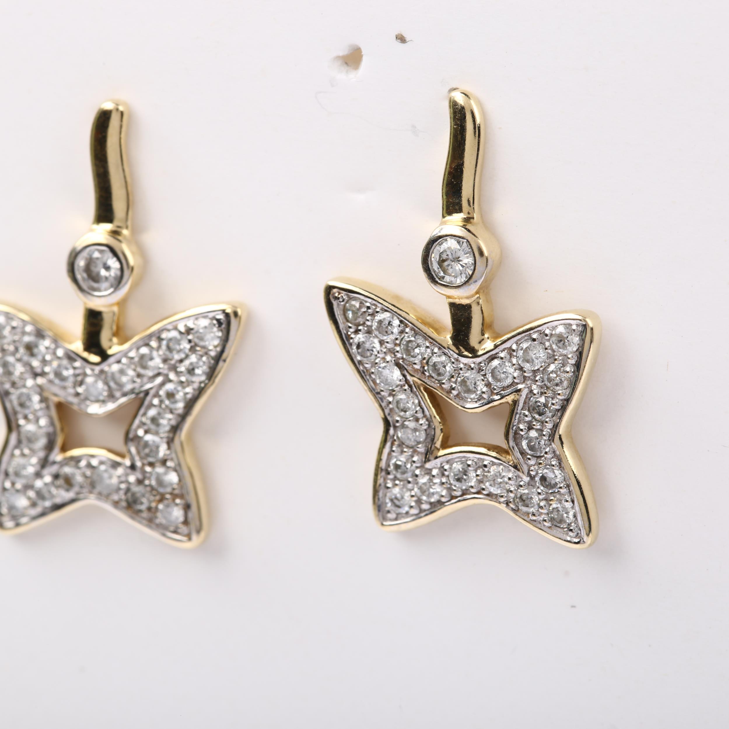 A pair of 9ct gold diamond star earrings, pave set with modern round brilliant-cut diamonds and stud - Image 2 of 4