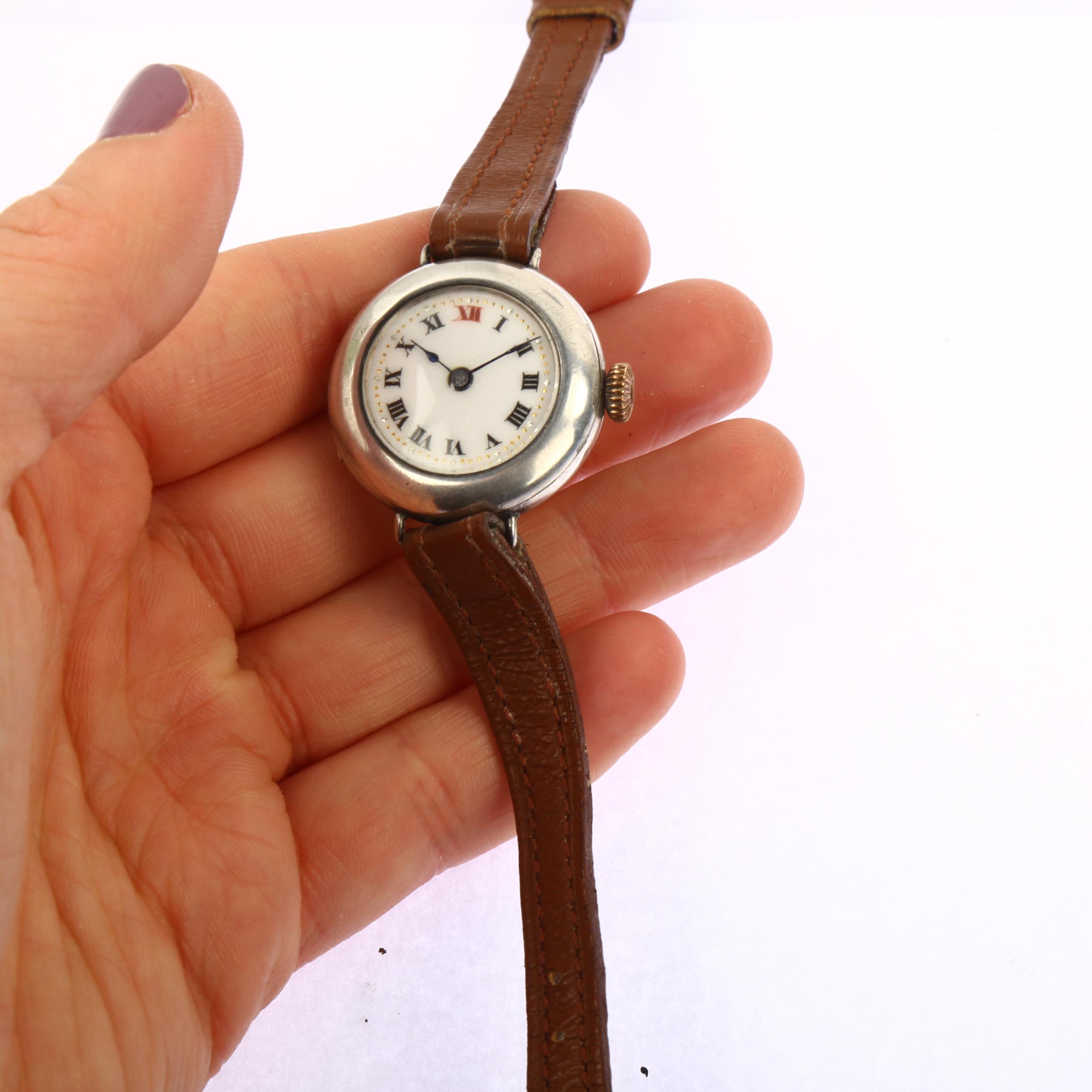 A First World War Period silver Officer's trench style mechanical wristwatch, white enamel dial with - Image 5 of 5