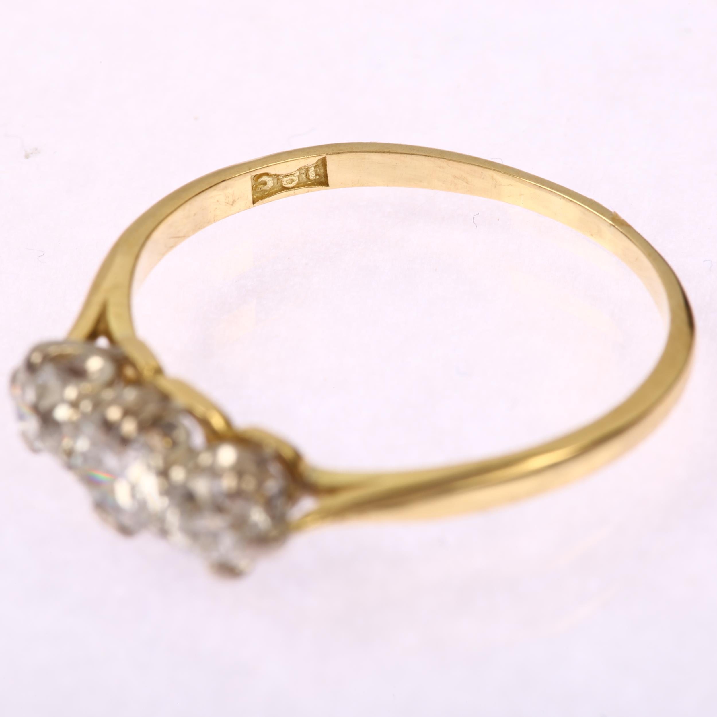 An early 20th century 18ct gold three stone diamond ring, claw set with old-cut diamonds, total - Image 3 of 4