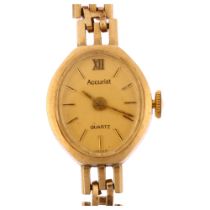 ACCURIST - a lady's 9ct gold quartz bracelet watch, champagne dial with gilt baton hour markers,