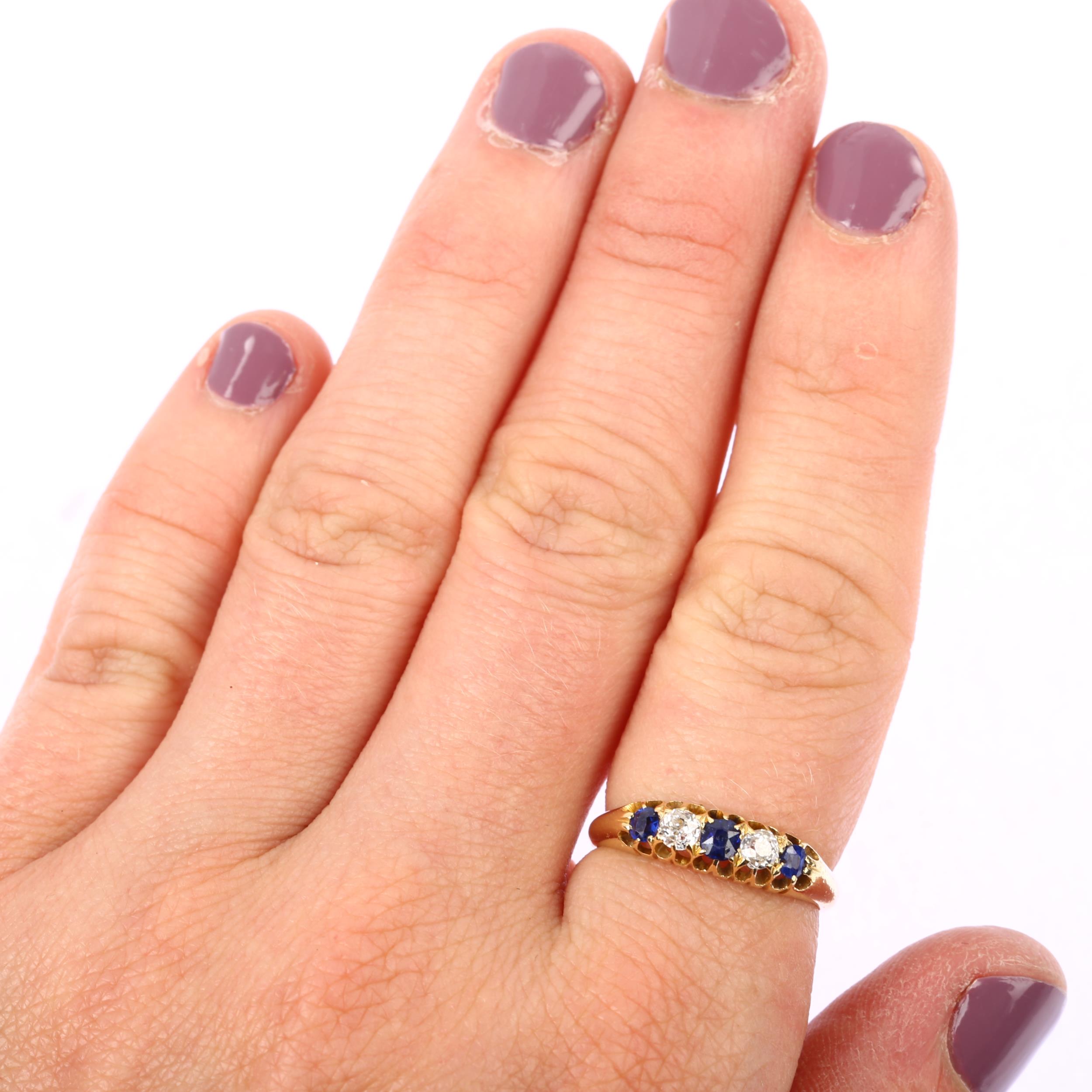 An early 20th century 18ct gold graduated five stone sapphire and diamond half hoop ring, set with - Image 4 of 4