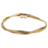A 9ct gold woven chain bracelet, textured design, length 18cm, 11.1g No damage or repair, bracelet