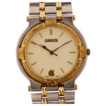 GUCCI - a gold plated stainless steel 9000M quartz bracelet watch, cream dial with gilt baton hour