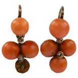 A pair of Victorian coral and diamond drop earrings, unmarked gold closed-back settings with round