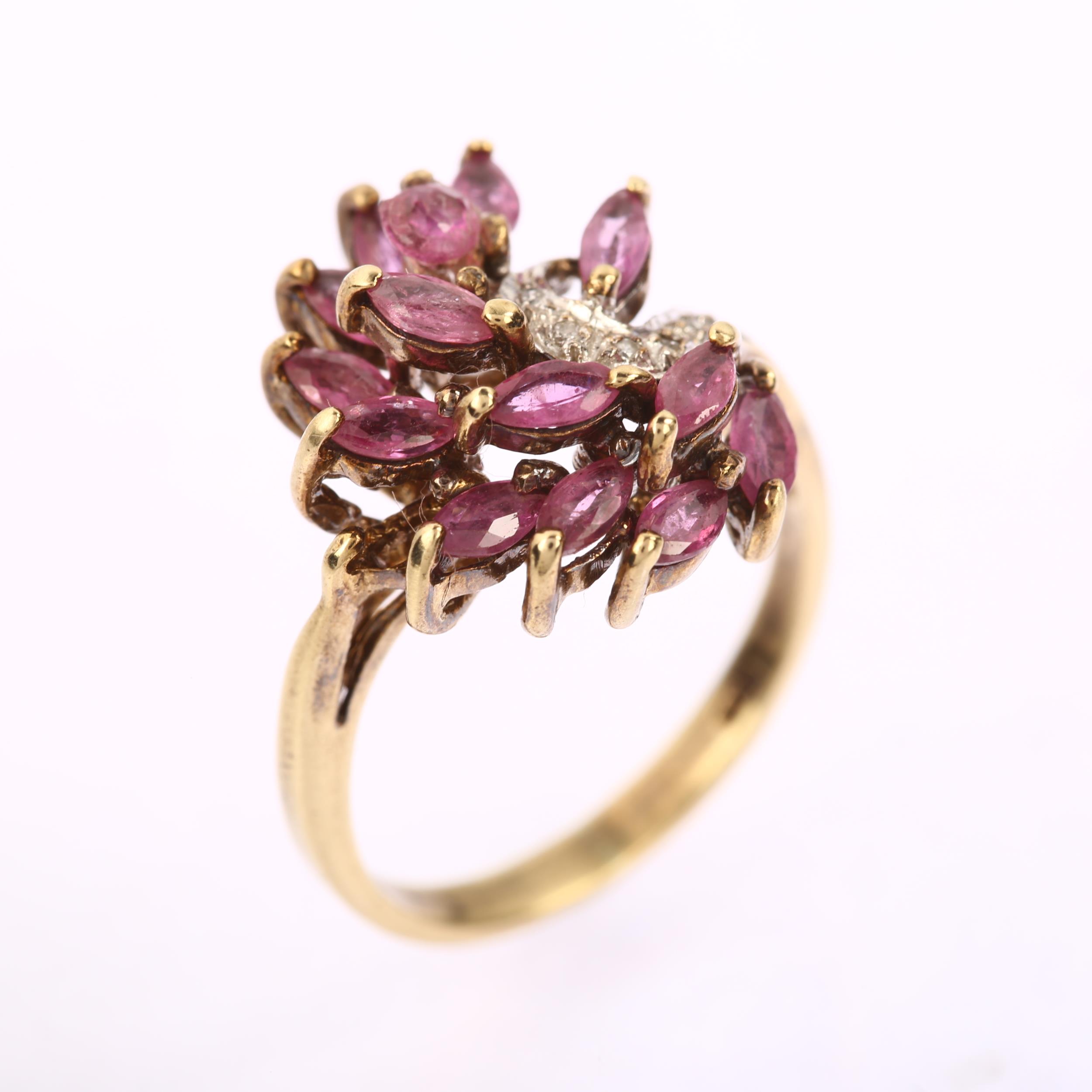 A late 20th century 9ct gold ruby and diamond cluster cocktail ring, set with marquise rubies and - Image 2 of 4