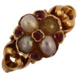 A Victorian ruby and pearl cluster ring, unmarked gold settings, with openwork foliate shoulders,