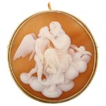 A Victorian shell cameo brooch, relief carved depicting Zeus and eagle, in Continental silver-gilt