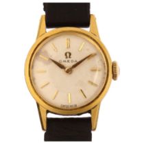 OMEGA - a lady's 18ct gold mechanical wristwatch, circa 1961, silvered dial with gilt baton hour