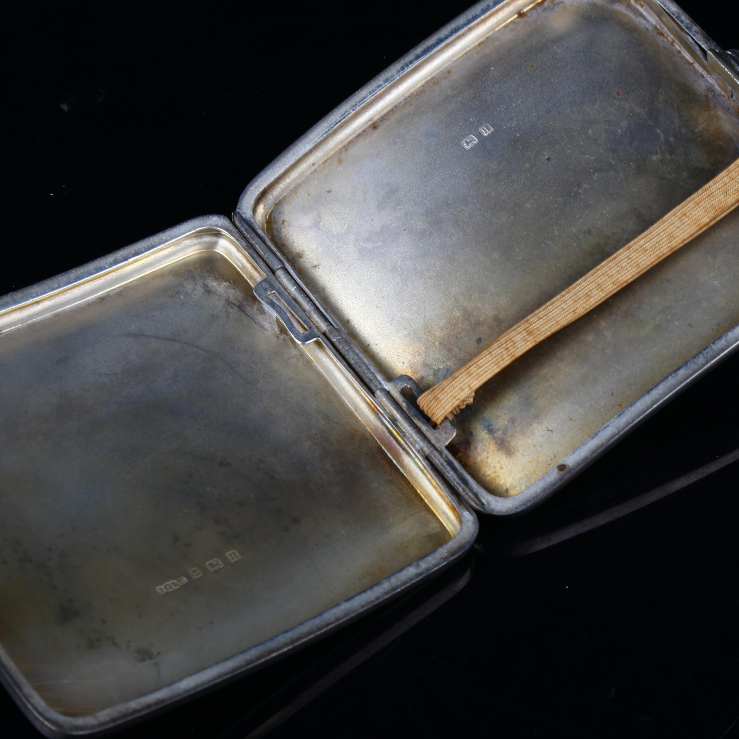 An Art Deco George V curved silver cigarette case, allover engine turned decoration with gilt - Image 3 of 3