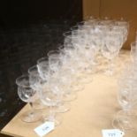 A set of 12 engraved Stuart Crystal wine glasses, H12.5cm, and a set of 12 matching Sherry glasses