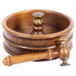 A turned fruitwood nut bowl, central brass-mounted column, together with a fruitwood and brass-