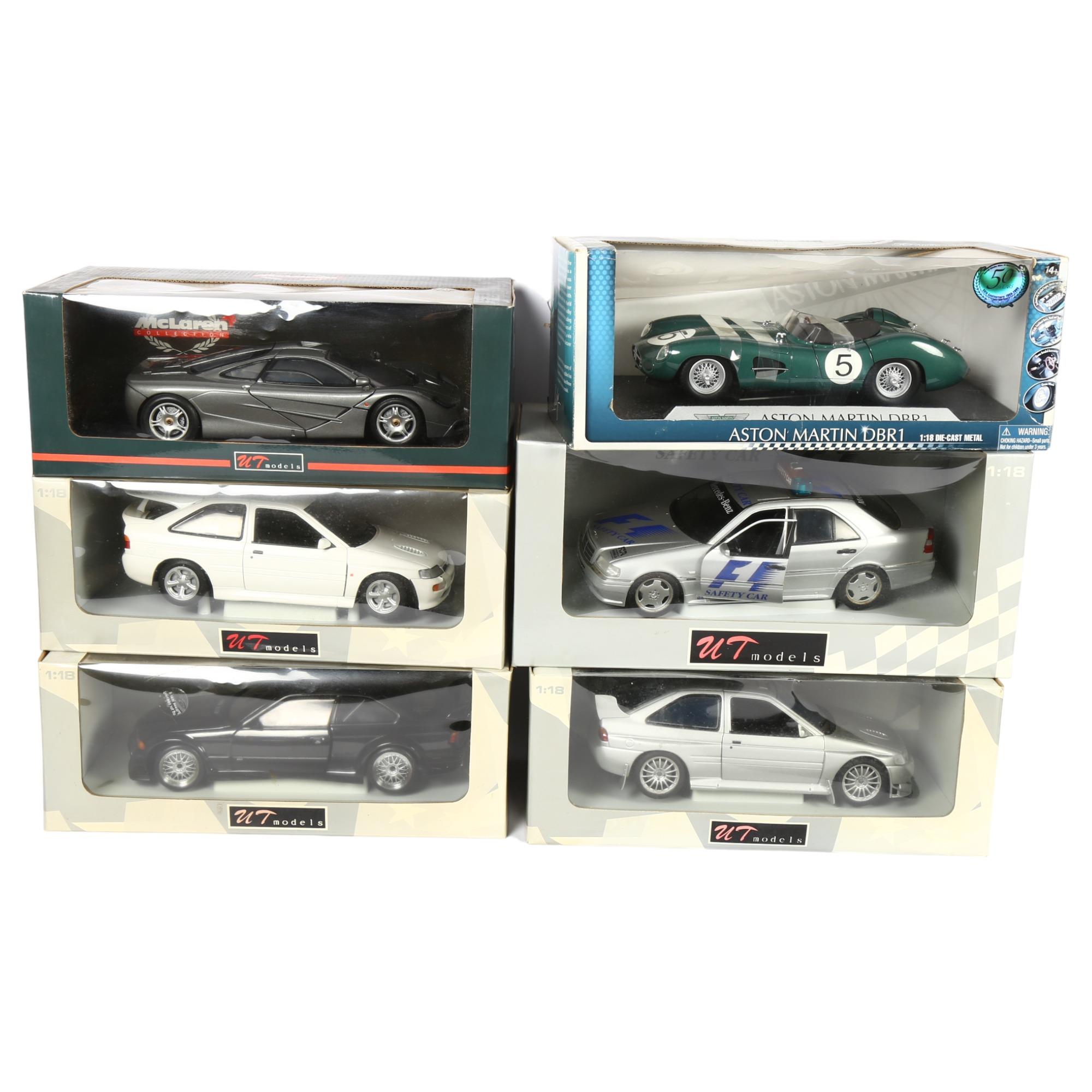 UT MODELS - a group of 1:18 scale diecast models, in original boxes, including Ford Escort RS