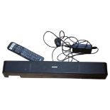 BOSE - A solo 5 TV surround sound bar, with mains cable and remote control.