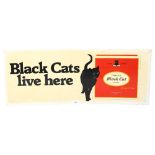 A Black Cats Live Here advertising sign, 28 x 70cm, in perspex