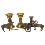 A pair of turned brass candlesticks, a brass chamber stick, and 2 brass horses and carriage (5)