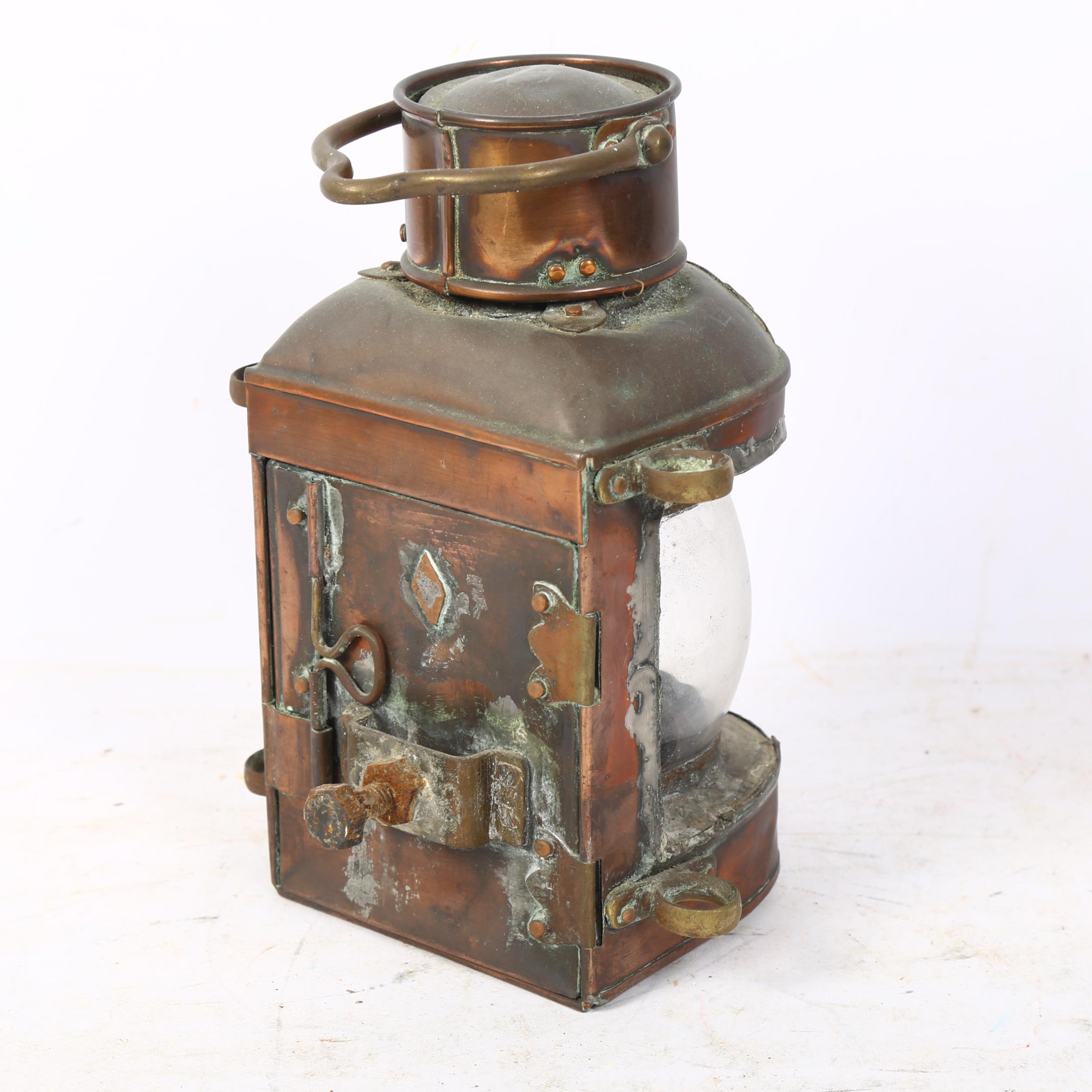 A Victorian copper ship's masthead lantern with swing handle, H22cm Lantern's in well used - Image 2 of 2