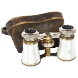 A pair of small early 20th century chrome plate and mother-of-pearl opera glasses, cased (no maker's
