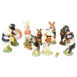 BESWICK - 9-piece pig band, largest height 13cm Trumpet detached but still present, French horn