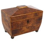 An 18th century burr-walnut and satinwood-banded sarcophagus tea caddy, inner fitted lids, on