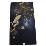 A pair of Japanese lacquered wooden panels, with applied bird and blossom decoration, H76cm