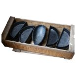 A Japanese wooden box containing stoneware vase and black glazed semi-circular side dishes
