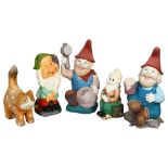 A group of 4 garden gnomes, including a gnome on a toadstool drinking beer, and a ceramic ginger cat