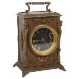 An oak style mantel clock, 8-day movement striking on a bell, the clock covered in a brown finish