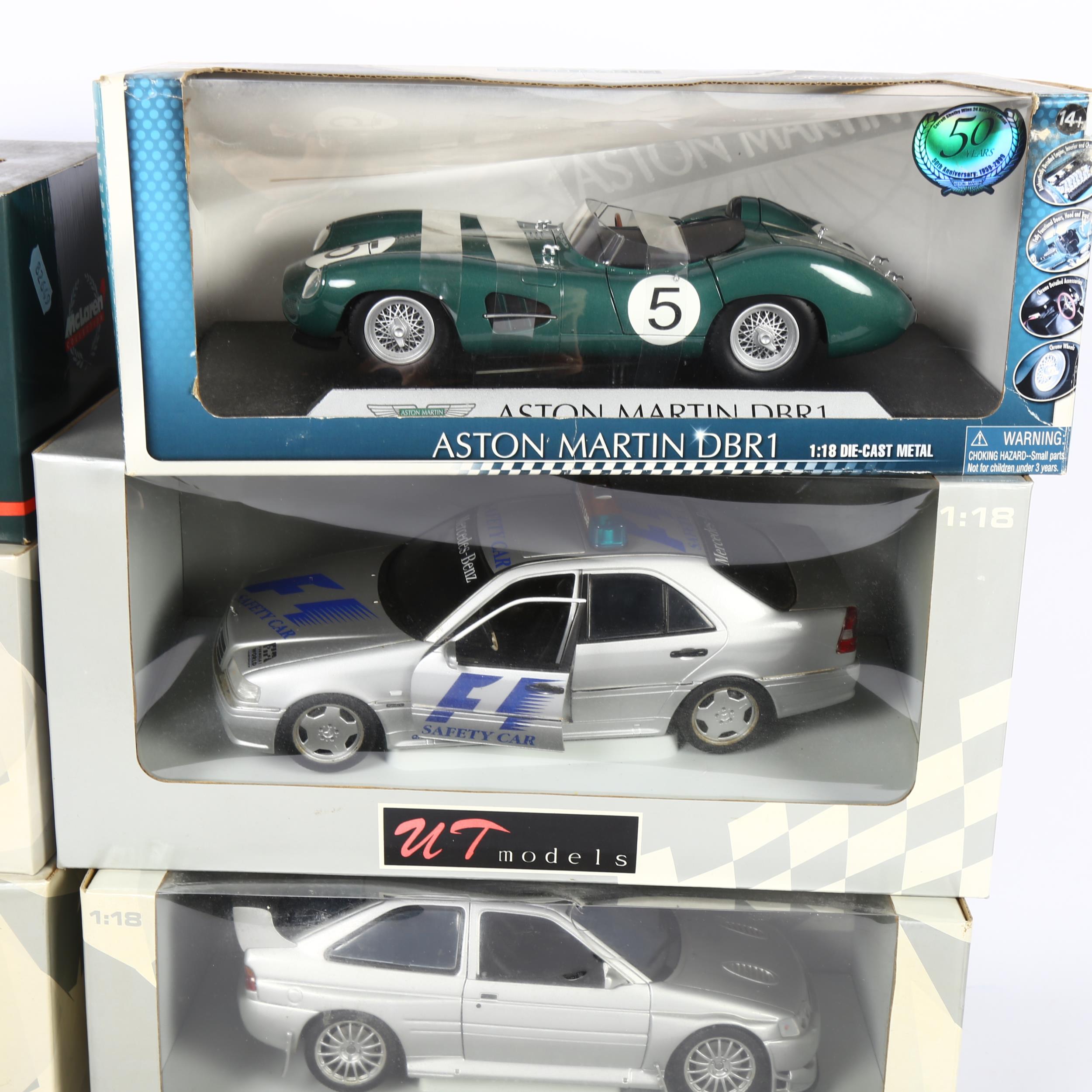 UT MODELS - a group of 1:18 scale diecast models, in original boxes, including Ford Escort RS - Image 2 of 2