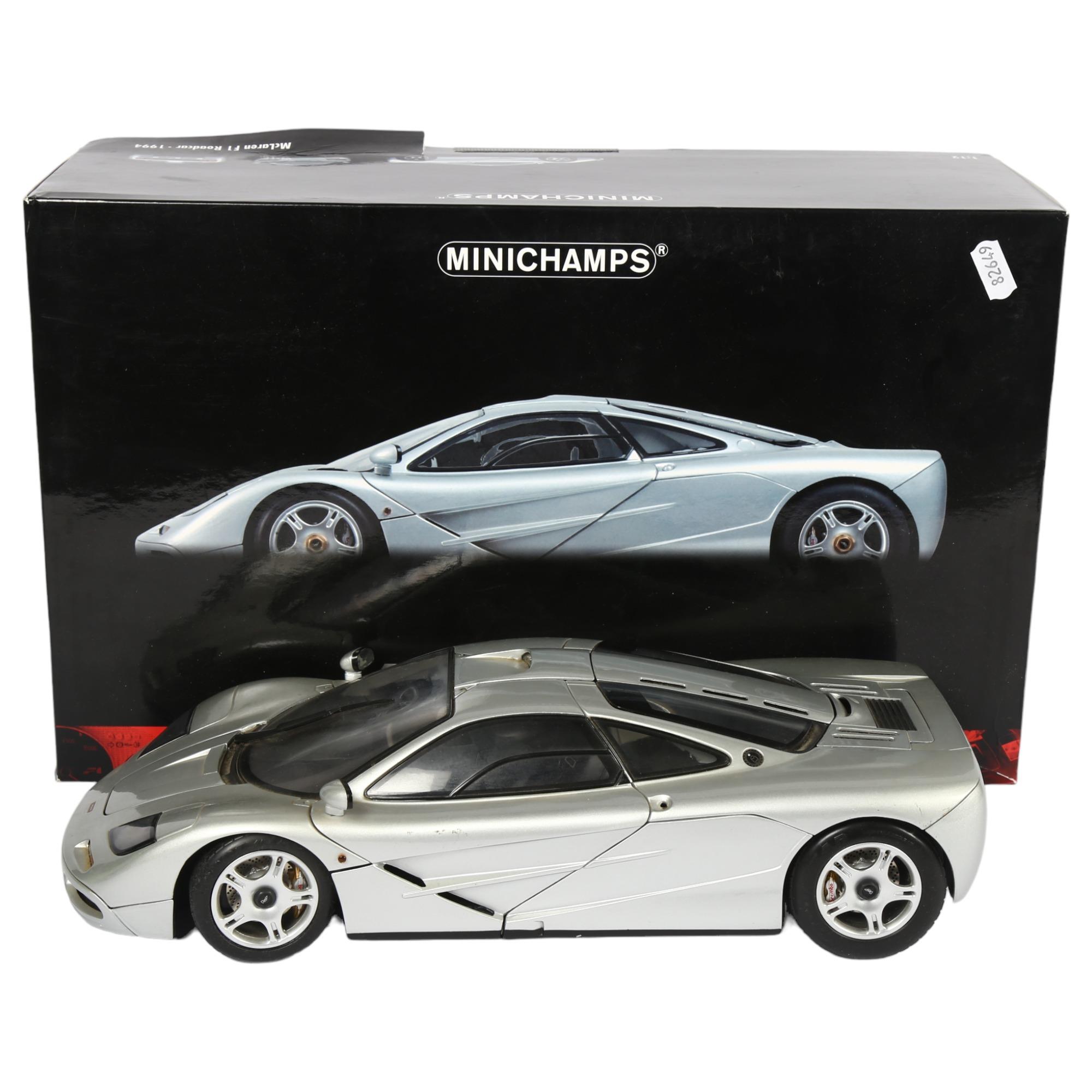 MINICHAMPS - a boxed 1:12 scale 1994 McLaren F1 Roadcar model by Minichamps, in original box Box -