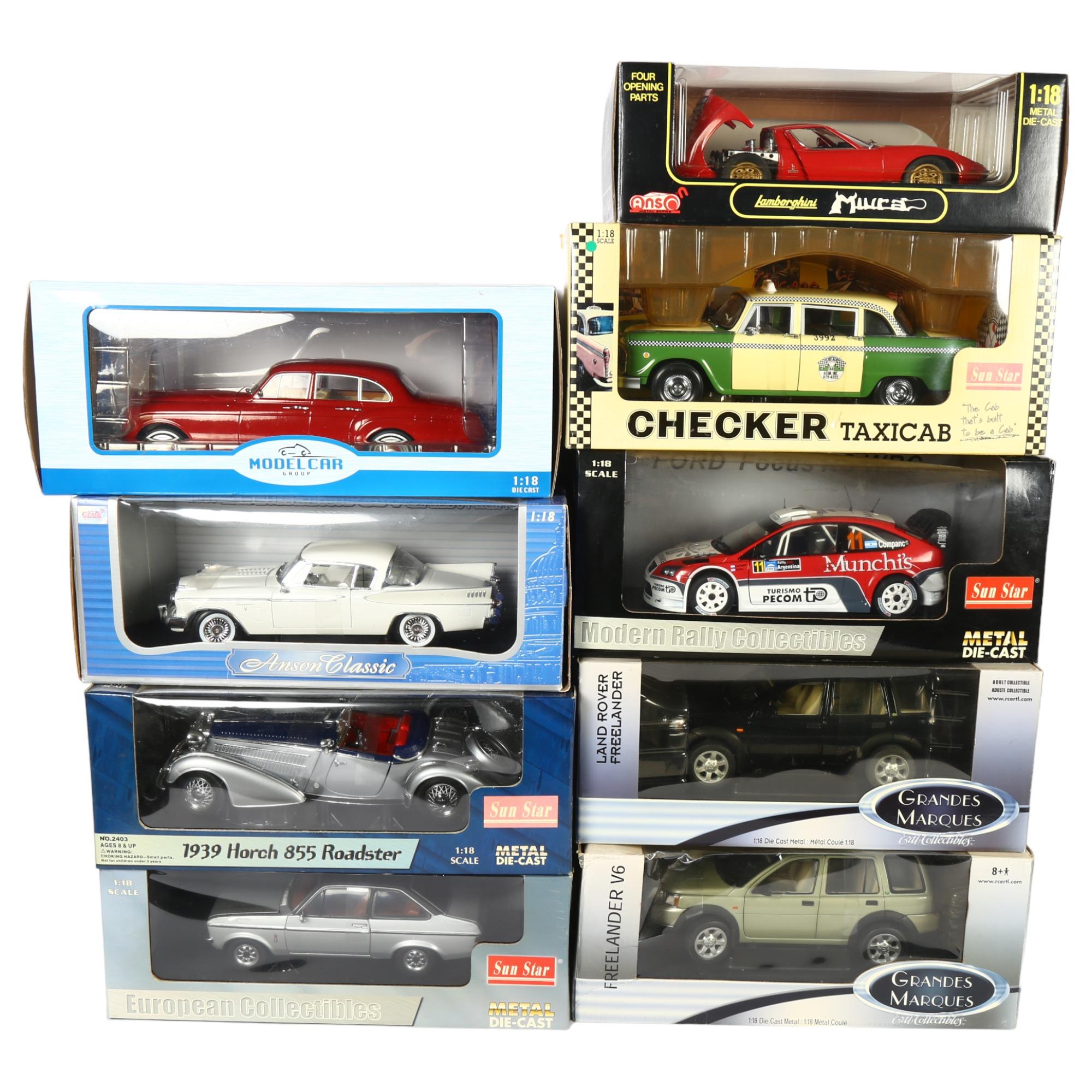 A quantity of 1:18 scale diecast models, in original boxes, some with associated display stands,
