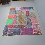 A patchwork wall hanging, 194x144cm