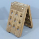 A French oak folding 18 bottle pupitre / champagne riddling rack, mark for Mercier Champagne, Height