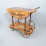 An Italianate mid-century design two-tier drinks trolley with marquetry decoration. 80x78x45cm