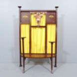 An Arts and Crafts mahogany fire screen with copper mount and painted decoration. Believed to have